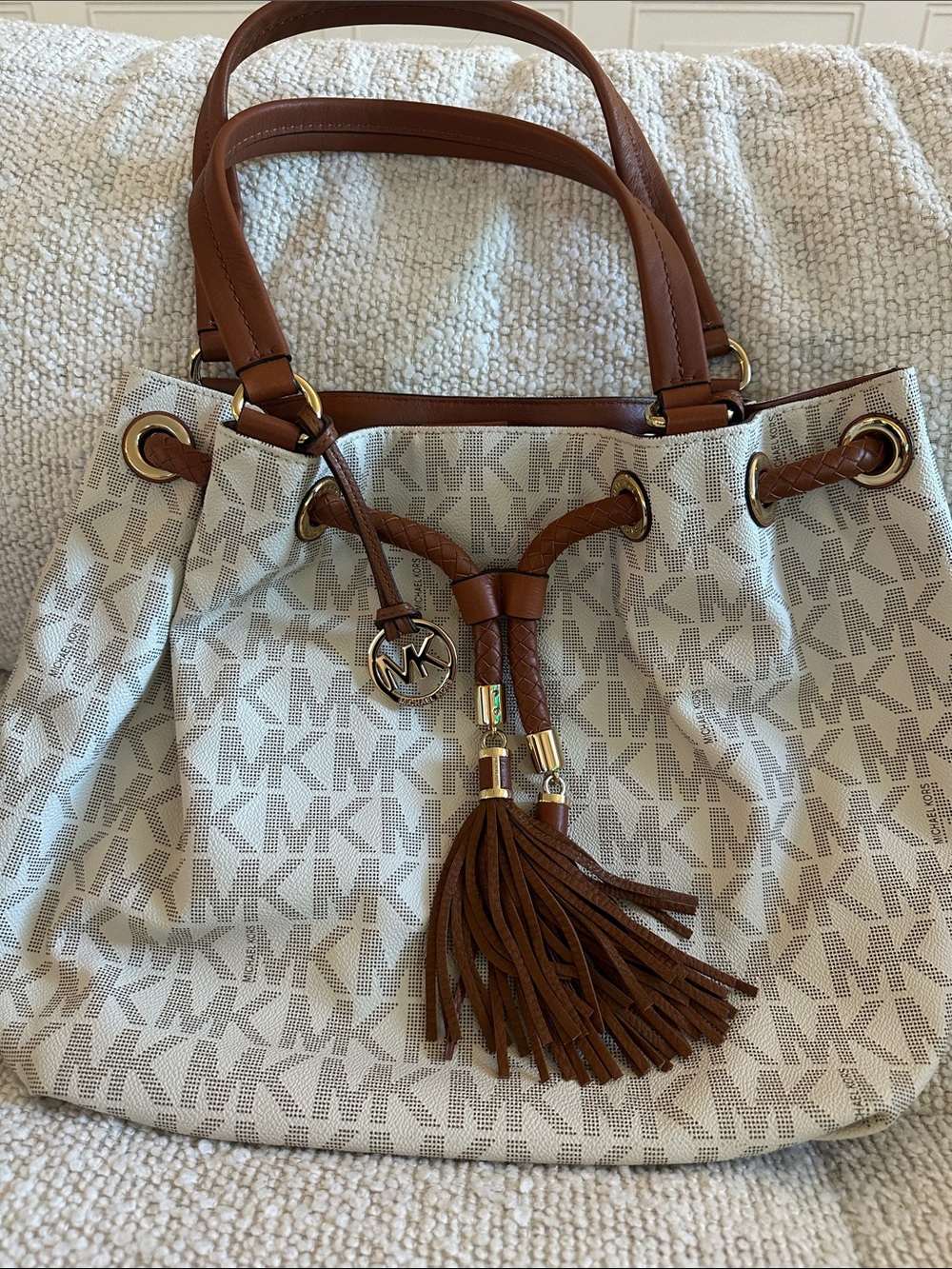 Michael Kors Cream Monogram Shoulder Tote with Brown Leather Tassel